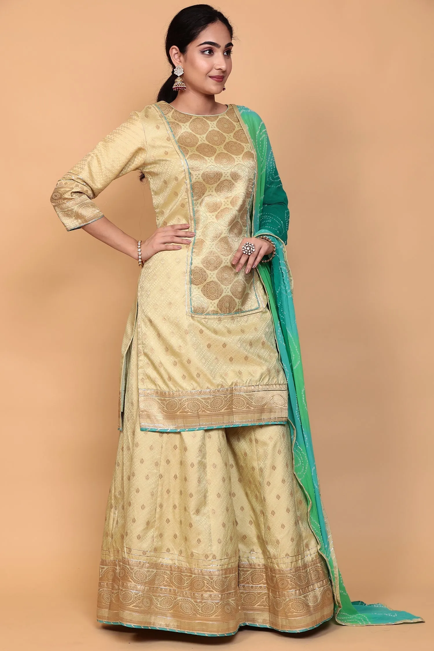 Banarasi Silk Suit with Gota work.