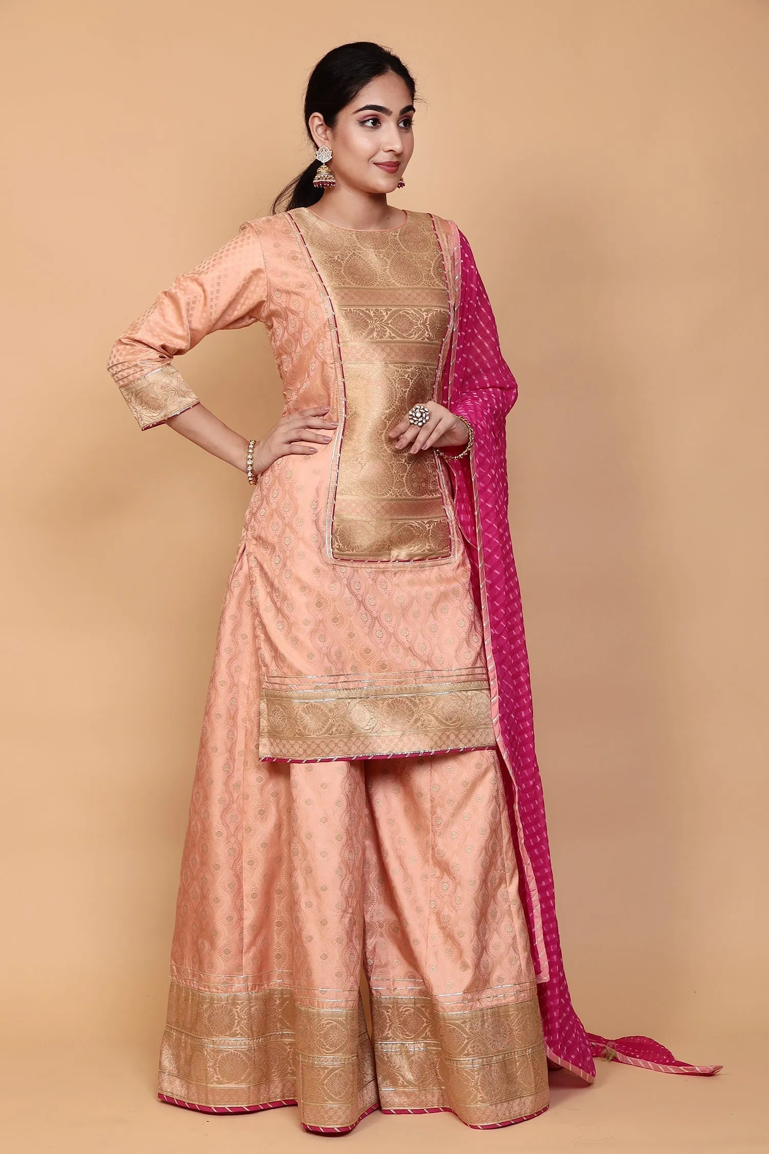 Banarasi Silk Suit with Gota work.