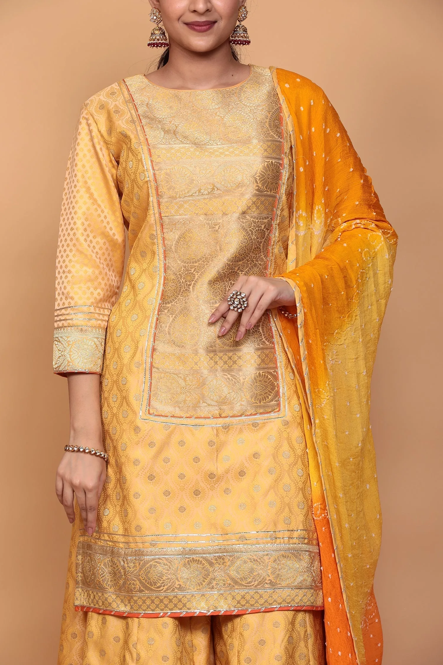 Banarasi Silk Suit with Gota work.