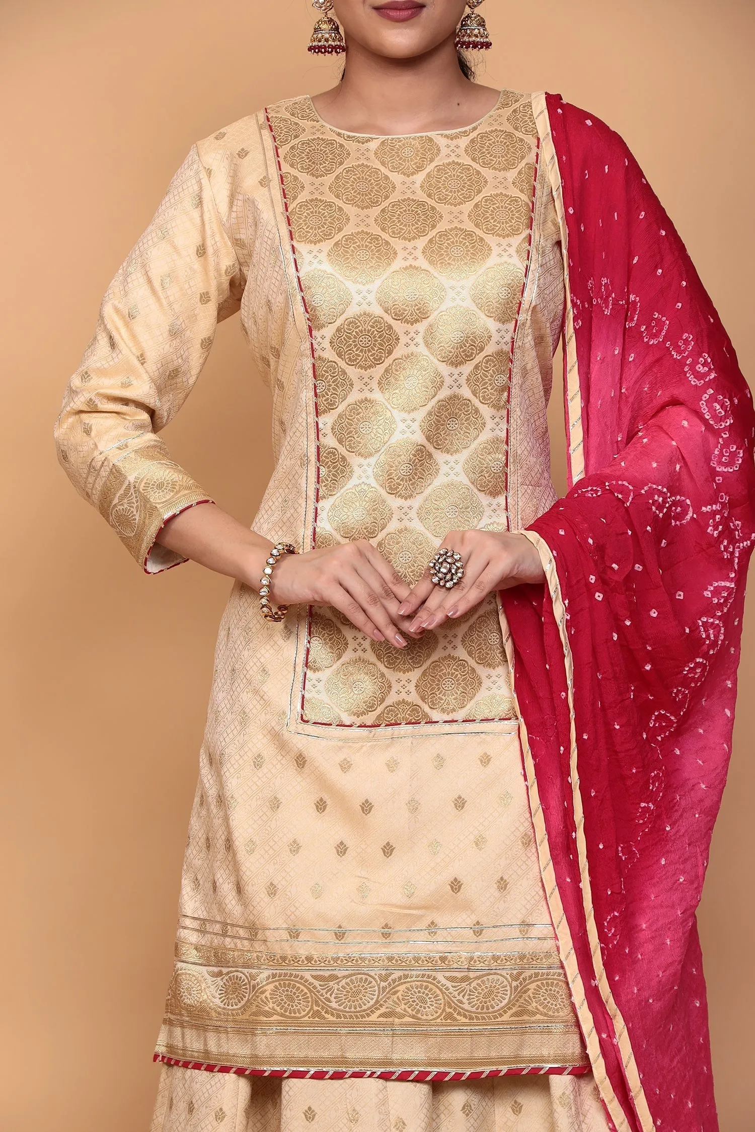 Banarasi Silk Suit with Gota work.